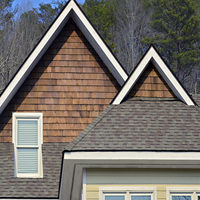 Home with new siding and shingles Home with new siding and shingles